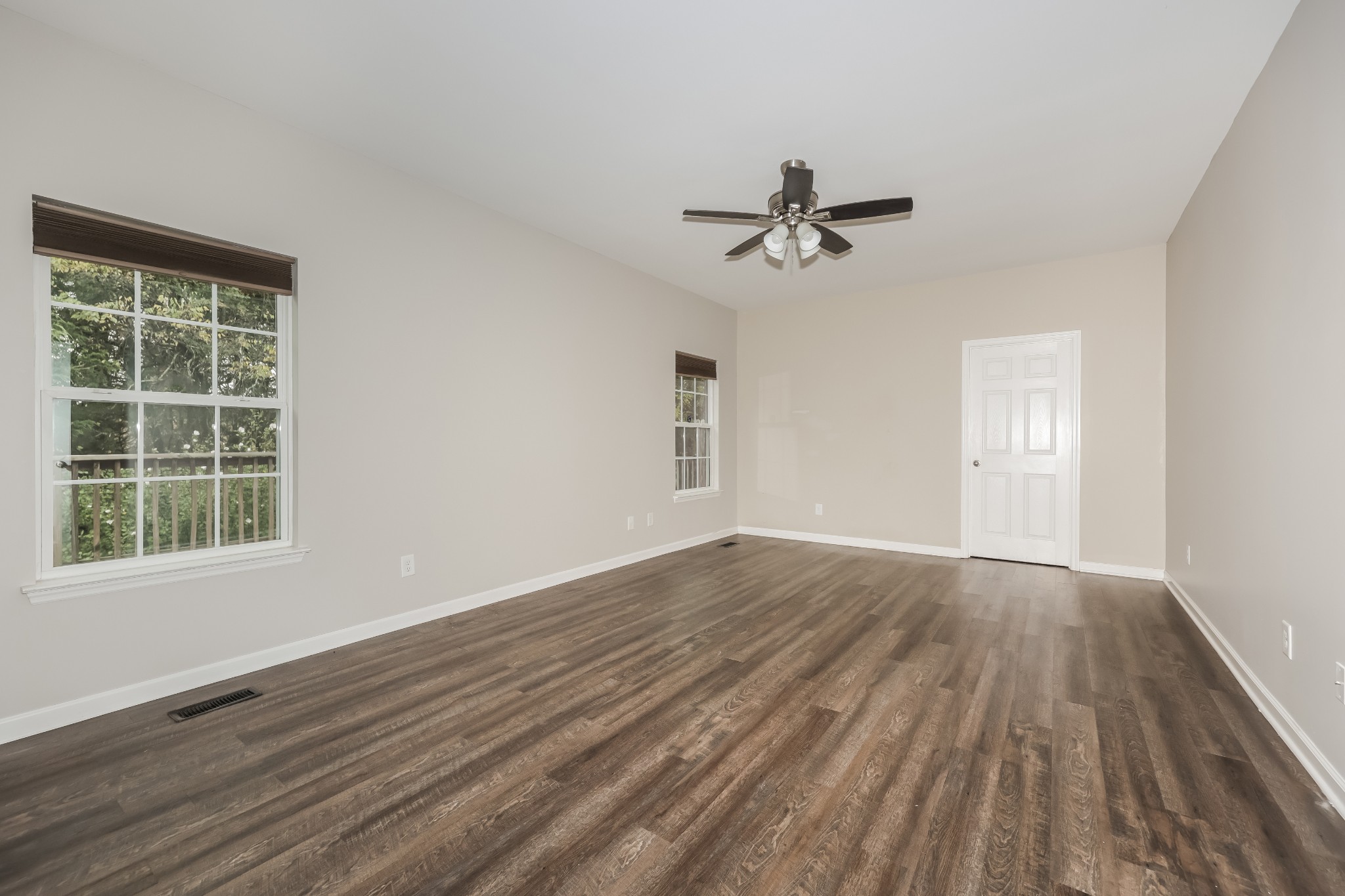 106 Abbey Road Lebanon, TN 37090 - Photo 7 of 17 a view of empty room with wooden floor and fan