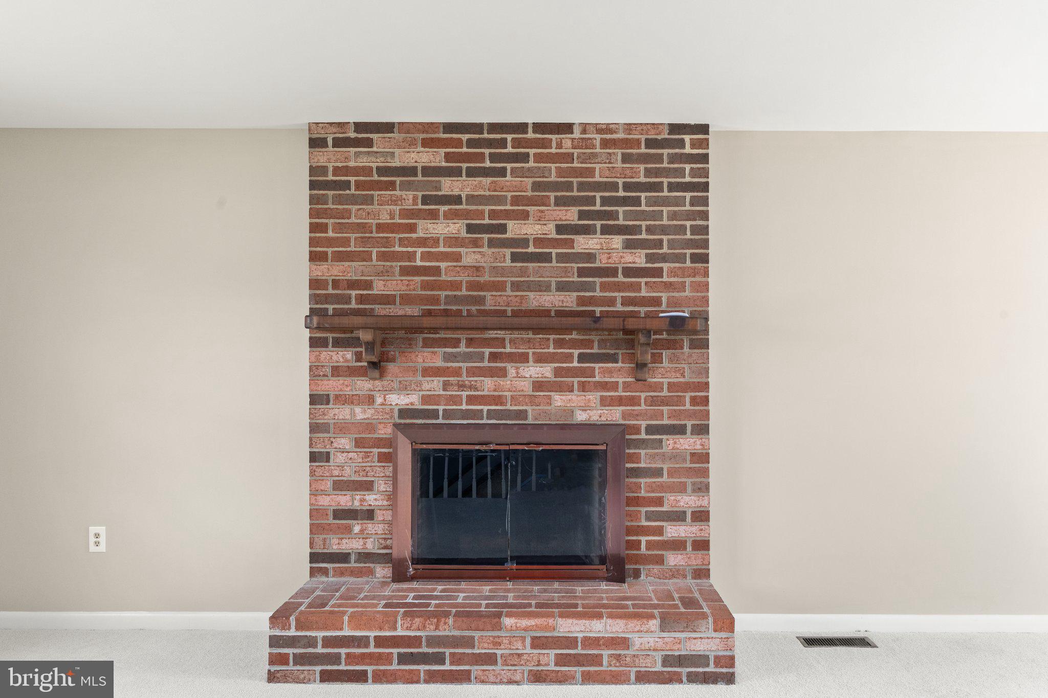 1003 Cedar Park Road Annapolis, MD 21401 - Photo 6 of 36 wood fireplace upstairs
