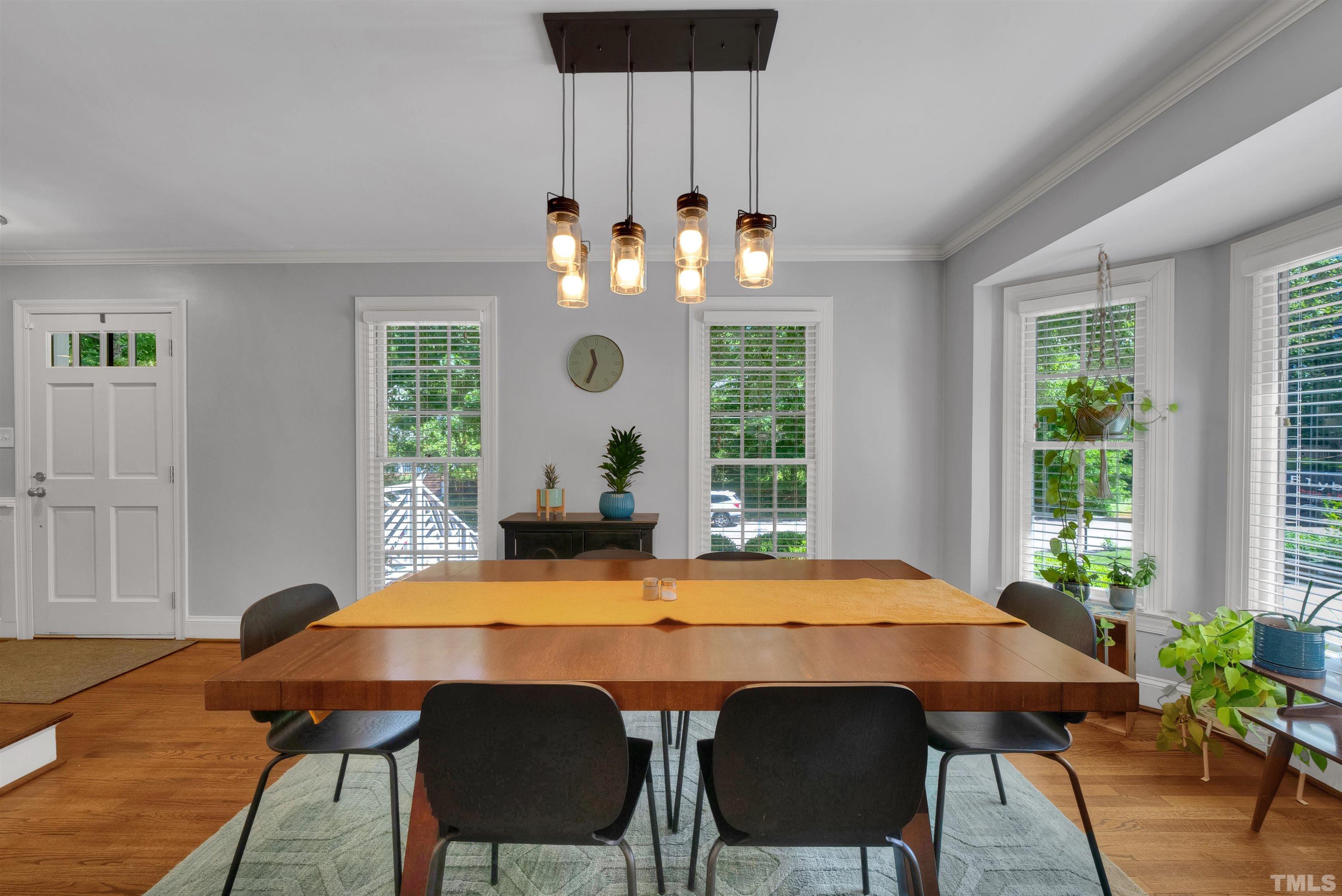 8209 Blue Heron Way Raleigh, NC 27615 - Photo 16 of 31 a view of a dining room with furniture and window
