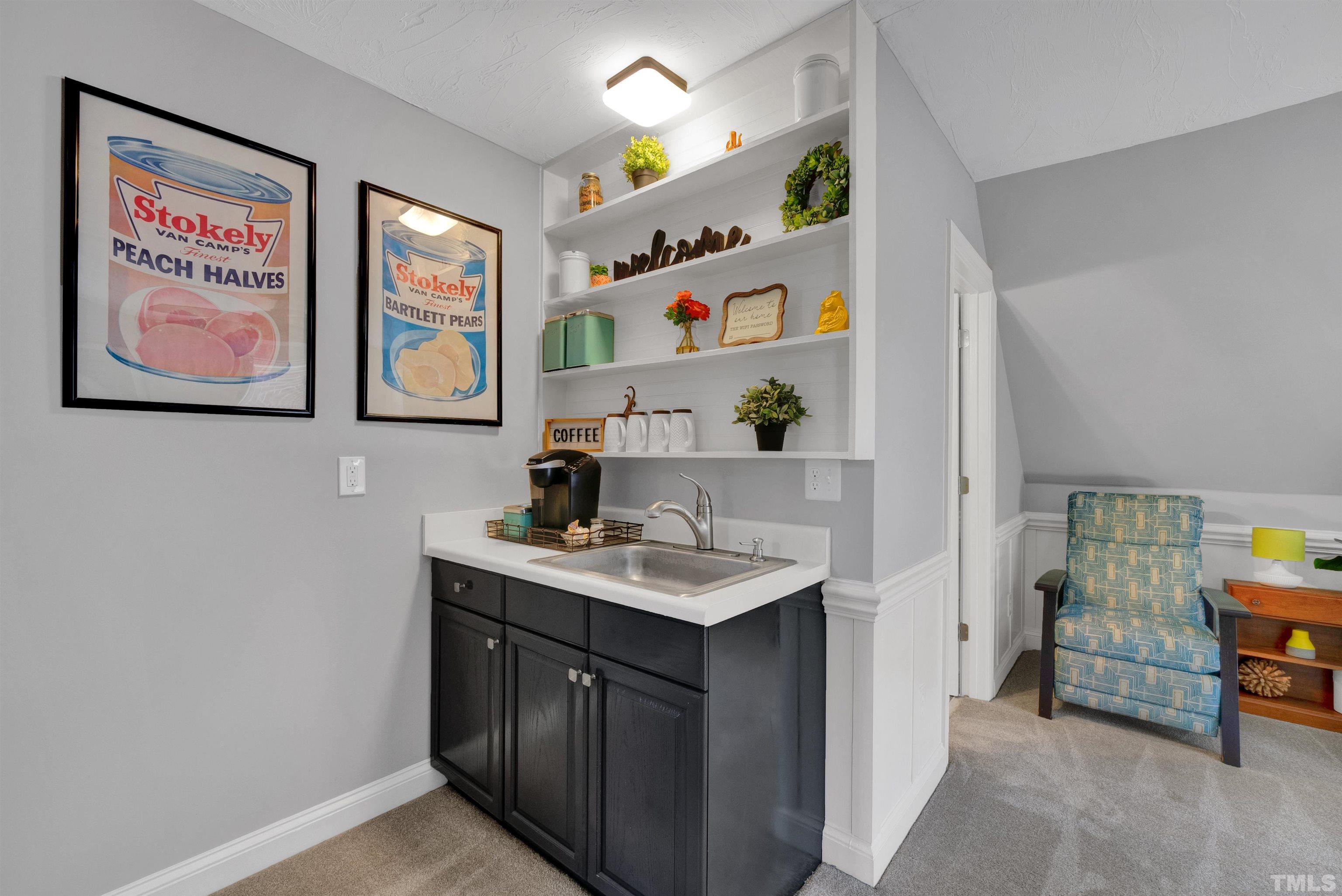 8209 Blue Heron Way Raleigh, NC 27615 - Photo 18 of 31 a bathroom with a sink and a mirror