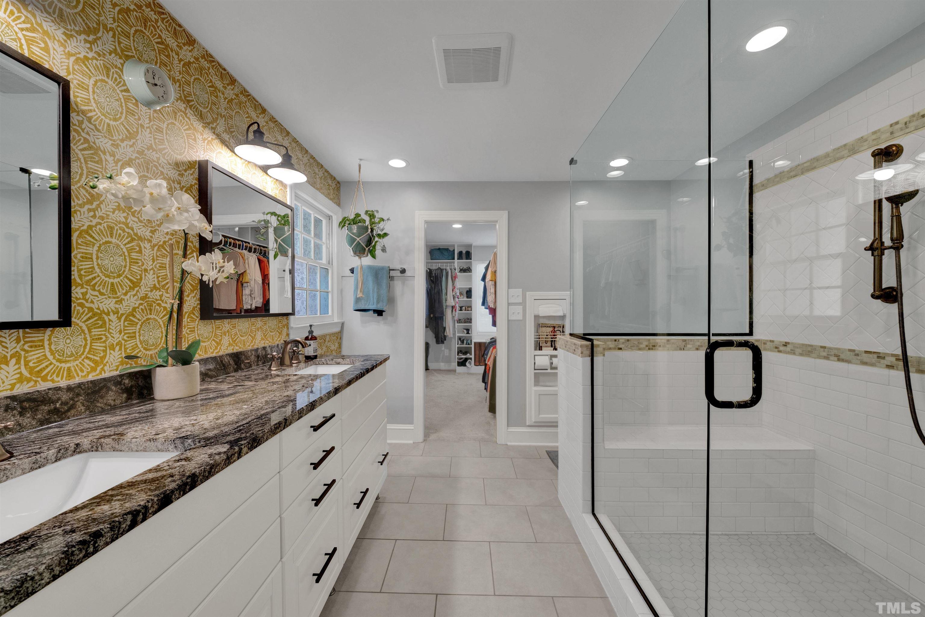 8209 Blue Heron Way Raleigh, NC 27615 - Photo 29 of 31 a bathroom with a double vanity sink mirror and double