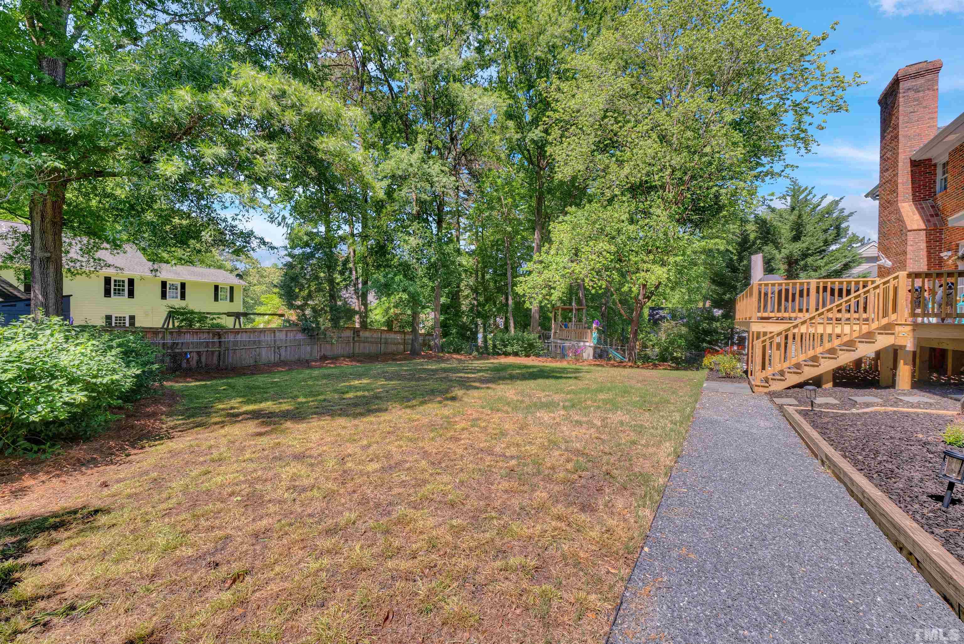 8209 Blue Heron Way Raleigh, NC 27615 - Photo 3 of 31 a view of street with houses