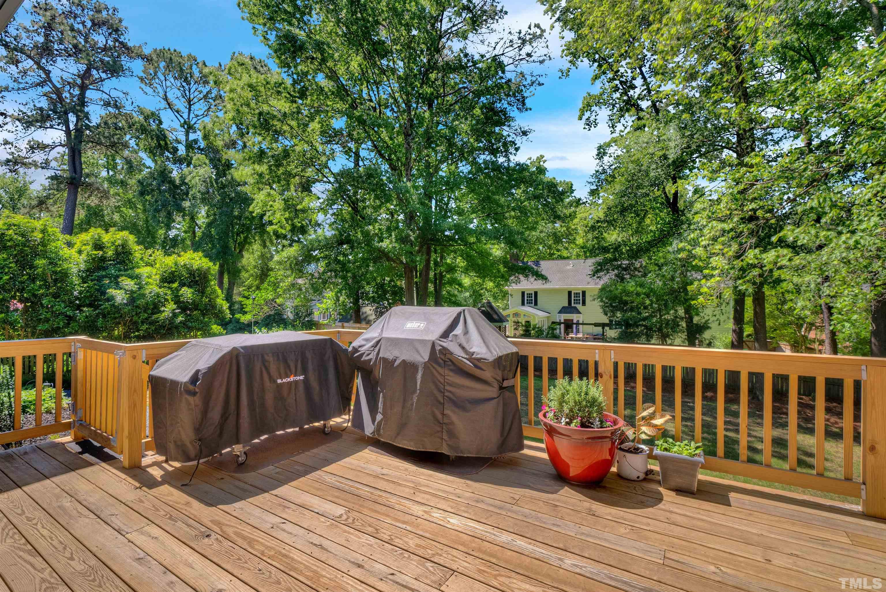8209 Blue Heron Way Raleigh, NC 27615 - Photo 6 of 31 a view of deck with wooden floor and seating space