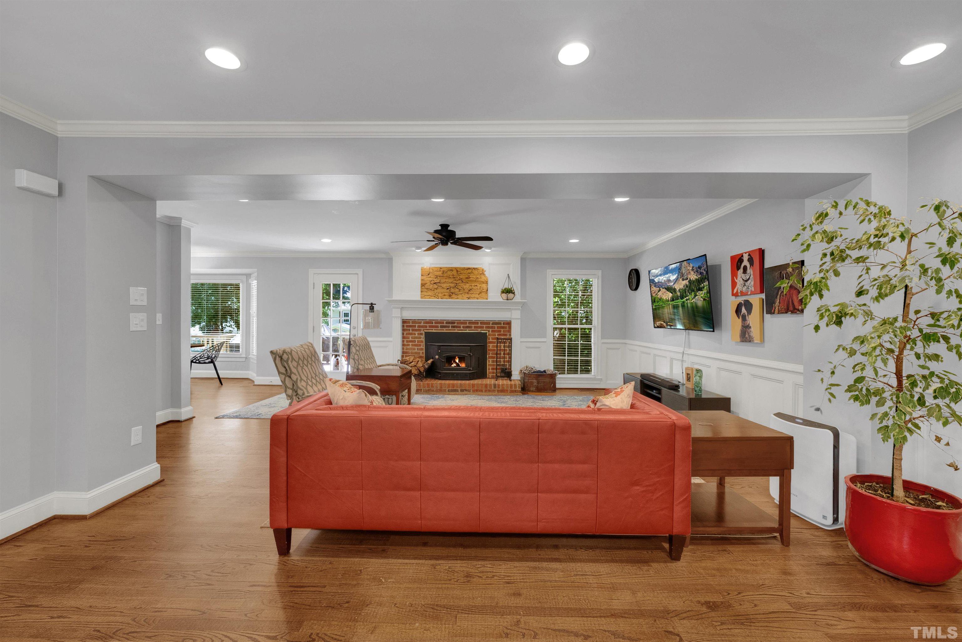 8209 Blue Heron Way Raleigh, NC 27615 - Photo 9 of 31 a bedroom with a bed window and potted plant