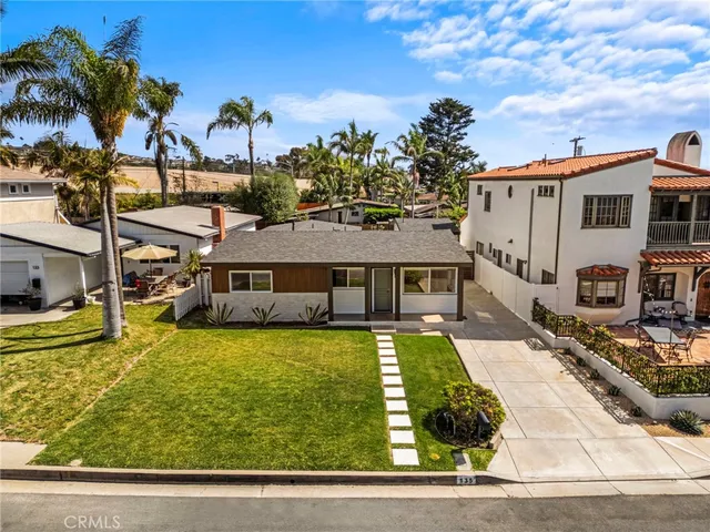 a view of a house with swimming pool
