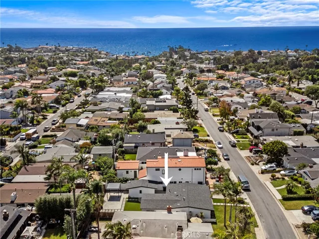 an aerial view of a city with lots of residential buildings