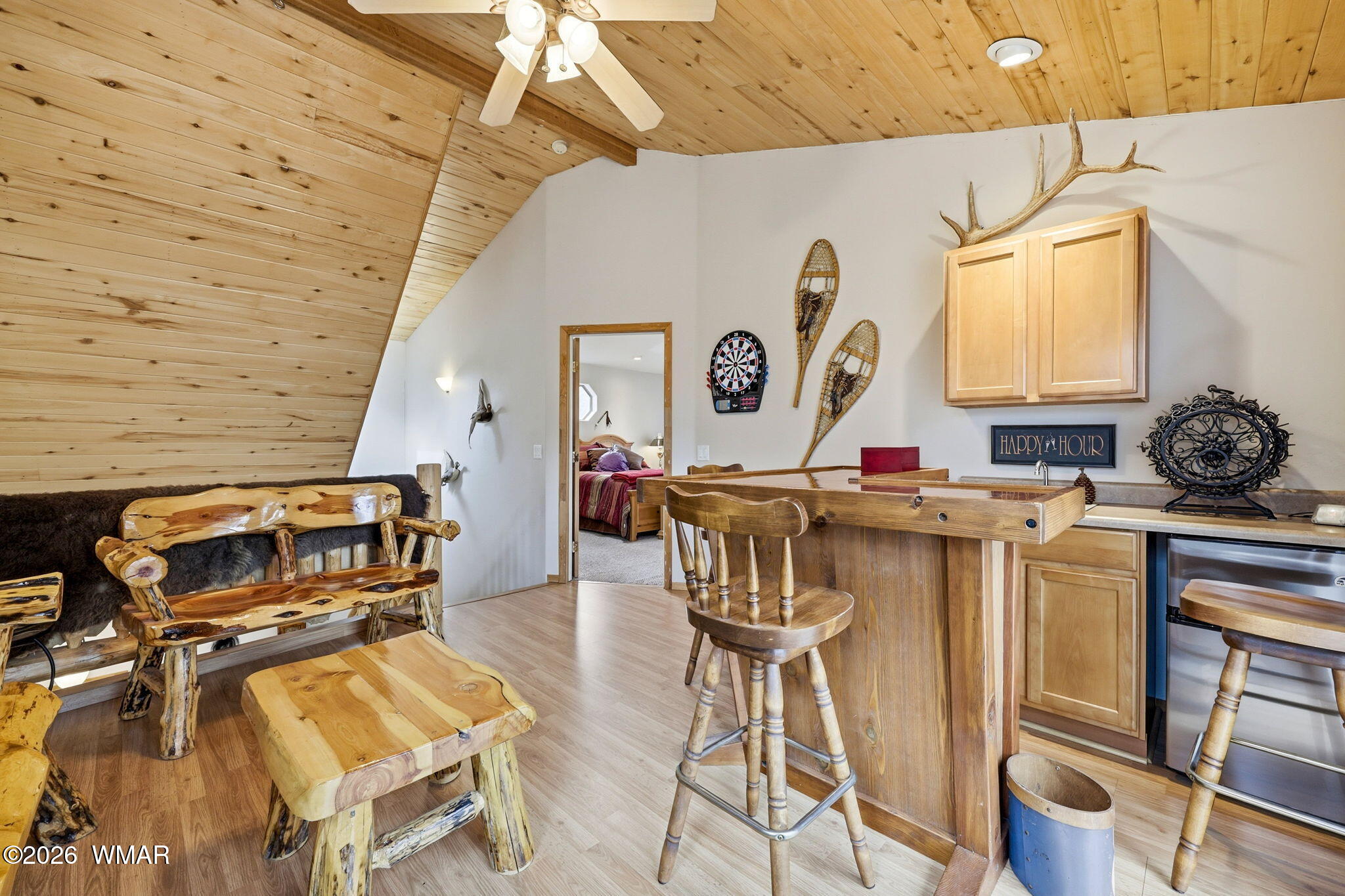2008 Lexington Overgaard, AZ 85933 - Photo 20 of 34 a living room with fireplace furniture and a wooden floor