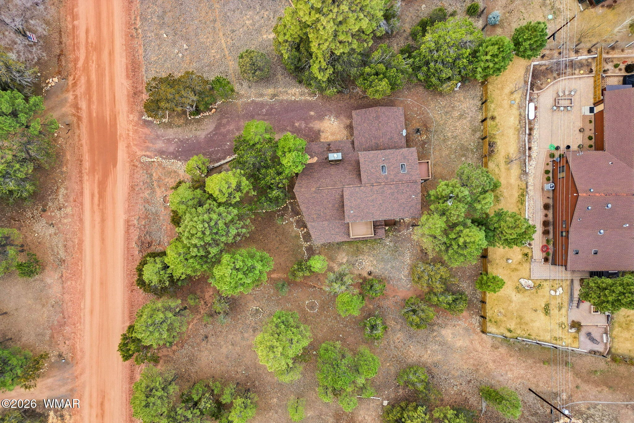 2008 Lexington Overgaard, AZ 85933 - Photo 33 of 34 an aerial view of a house with a yard and a garden