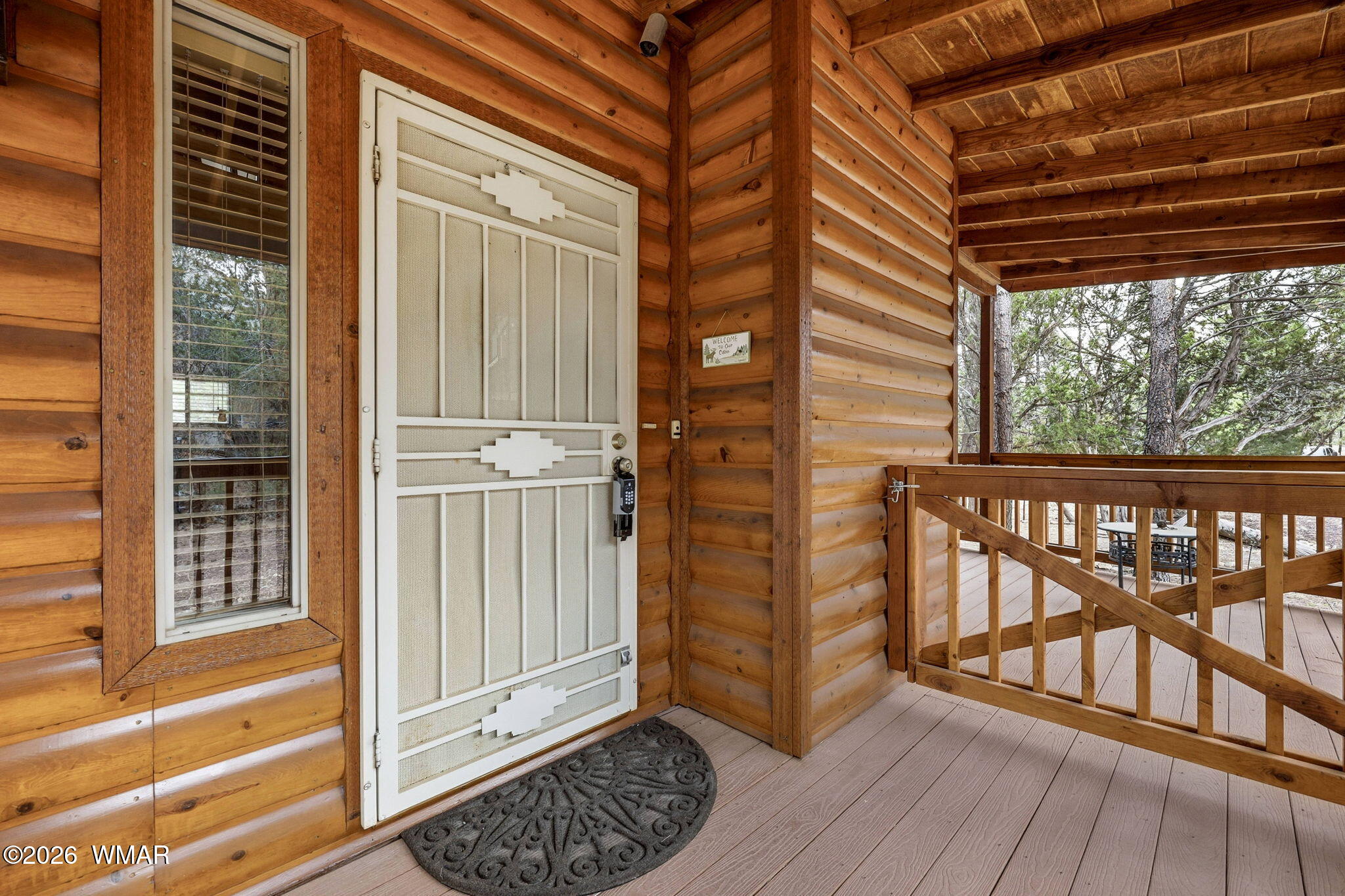 2008 Lexington Overgaard, AZ 85933 - Photo 6 of 34 a view of a porch with wooden floor and iron stairs