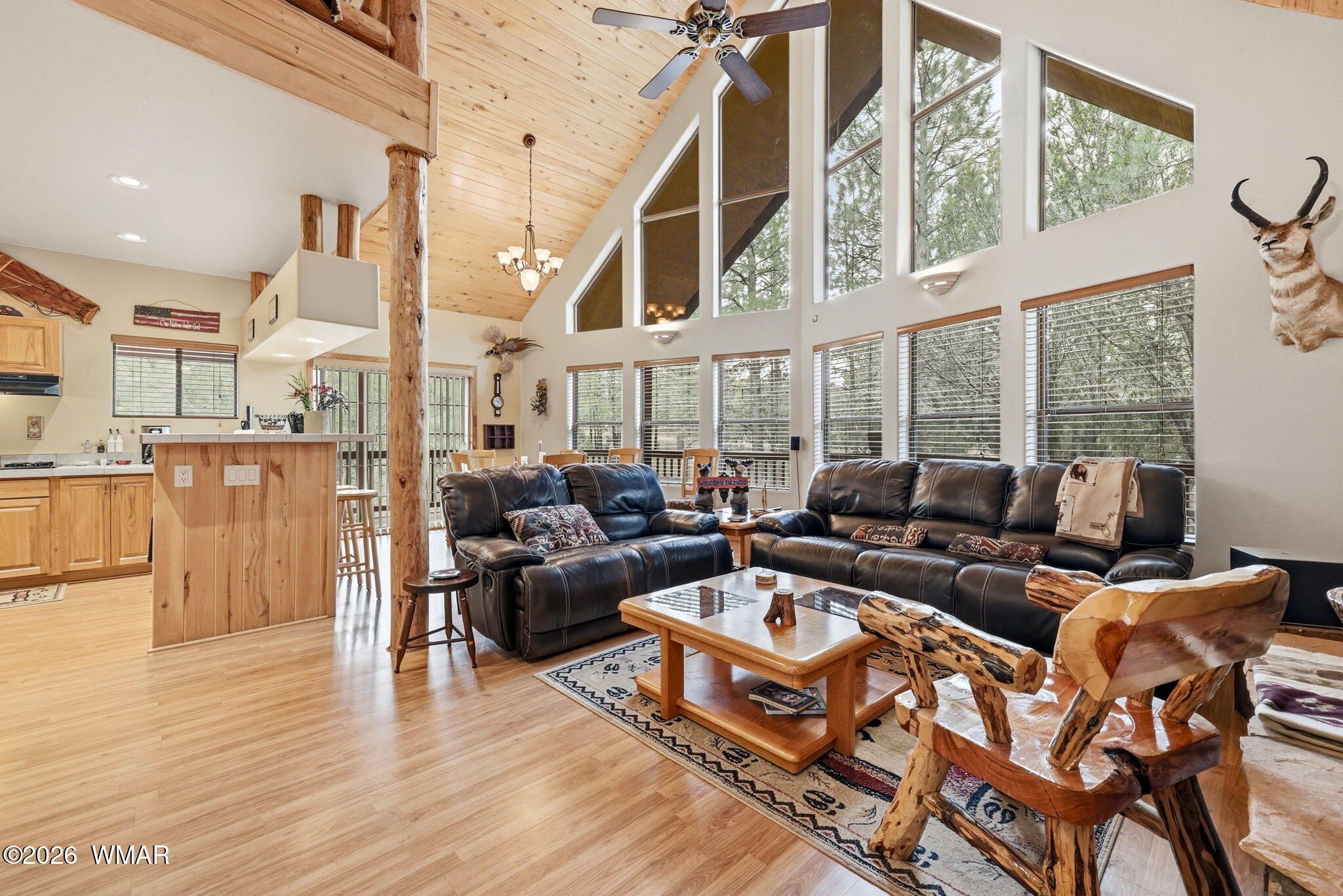 2008 Lexington Overgaard, AZ 85933 - Photo 7 of 34 a living room with furniture wooden floor and a large window