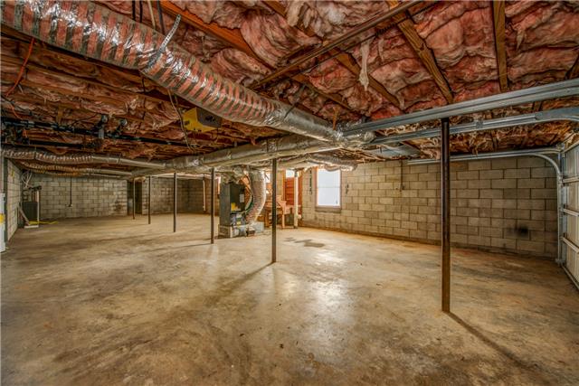 7819 Ridgewood Road Goodlettsville, TN 37072 - Photo 3 of 19 Unfinished basement with 2 car garage