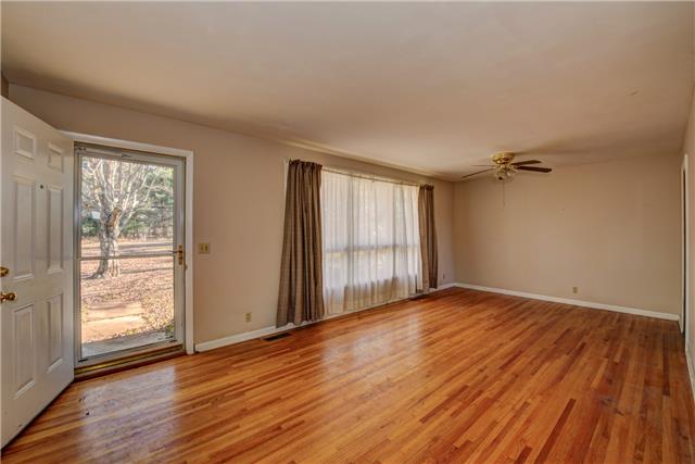 7819 Ridgewood Road Goodlettsville, TN 37072 - Photo 9 of 19 Large living room with hardwood floors