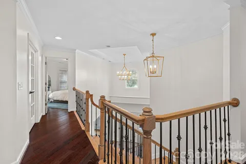 a view of a hallway with windows
