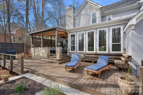 a view of a patio with a table and chairs