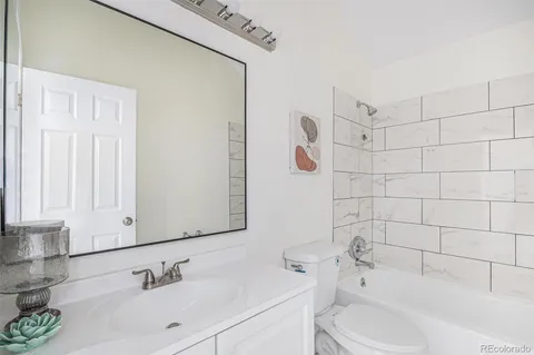 a bathroom with a sink and a bathtub