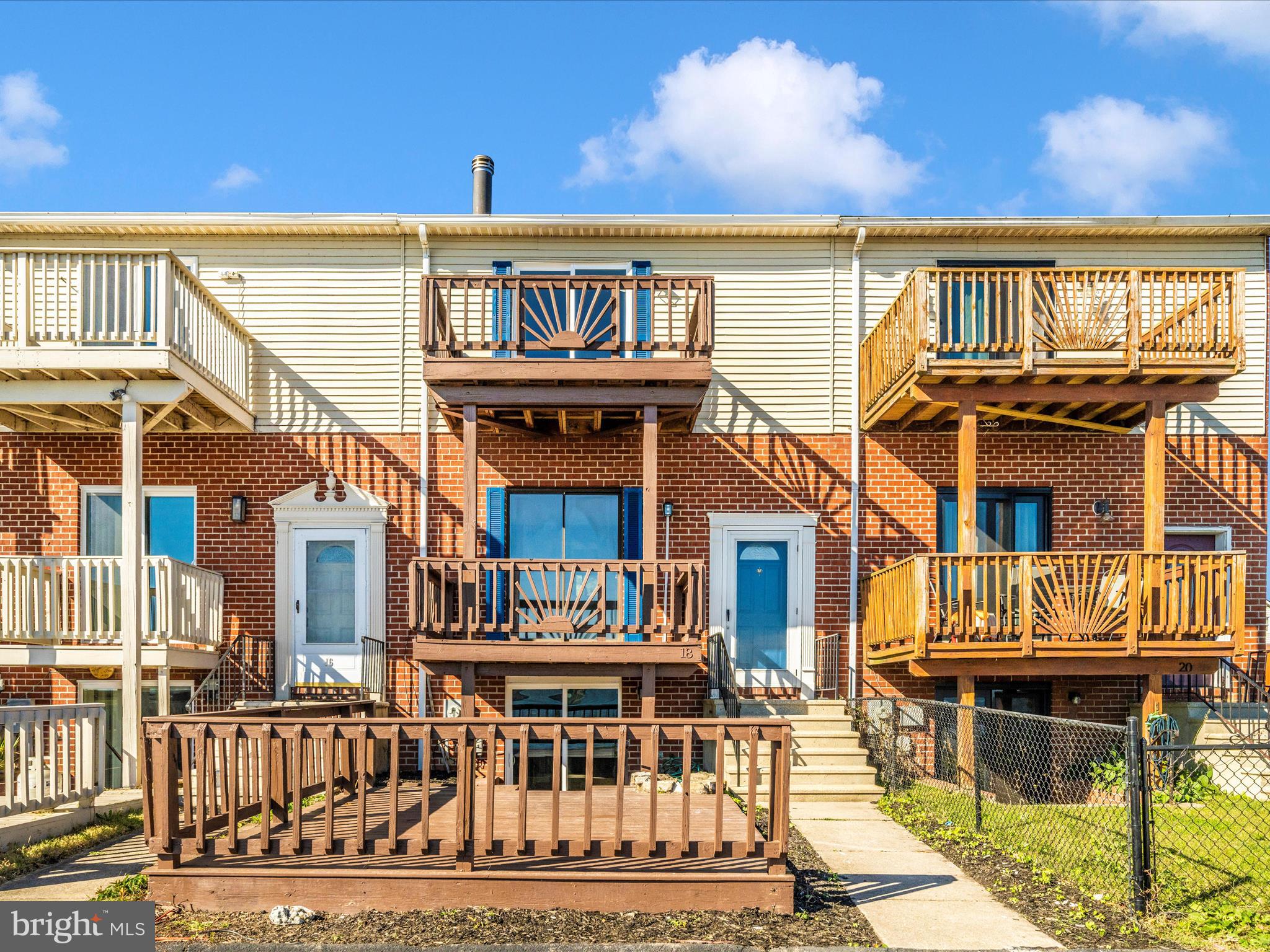 front view of a house with a balcony