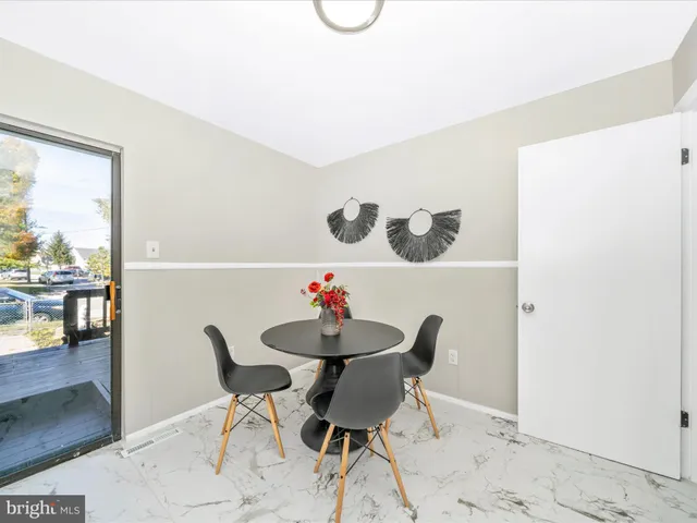 a kitchen with a sink and a stove top oven