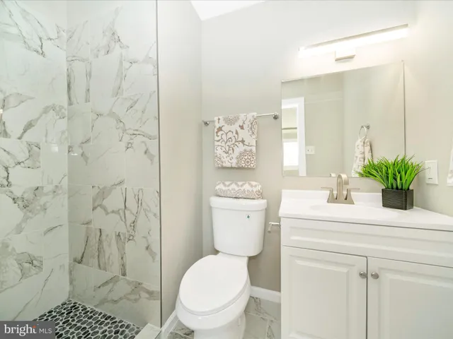 a view of a room that has a window in it