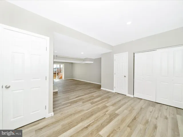 a view of porch with a bench