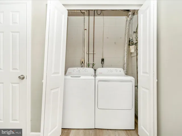 a view of a balcony with chairs