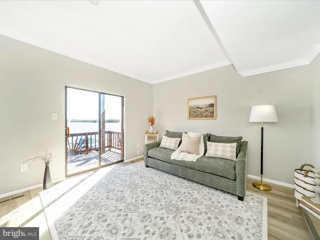 a bedroom with a large bed and a couch