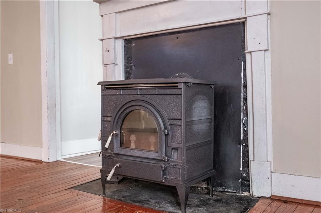 663 Ruritan Road Roaring River, NC 28669 - Photo 16 of 43 Wood stove located in the living room.