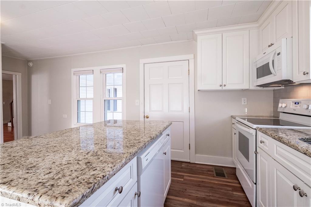 663 Ruritan Road Roaring River, NC 28669 - Photo 19 of 43 Kitchen features granite countertops.