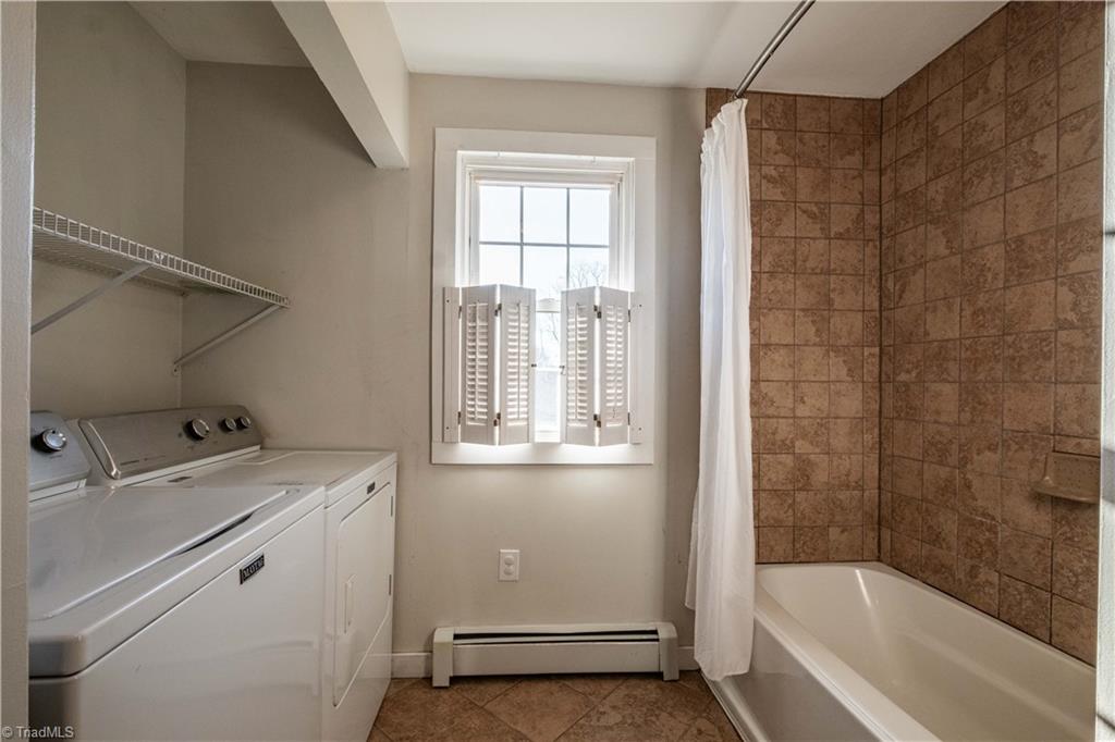 663 Ruritan Road Roaring River, NC 28669 - Photo 22 of 43 Full bathroom and laundry room located on main level.
