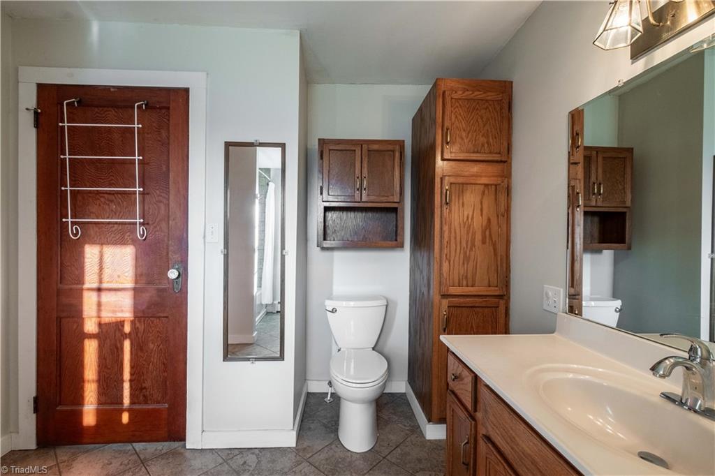 663 Ruritan Road Roaring River, NC 28669 - Photo 23 of 43 Full bathroom and laundry room located on main level.