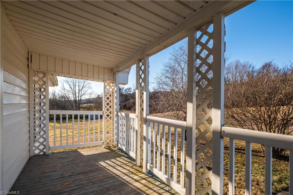 663 Ruritan Road Roaring River, NC 28669 - Photo 30 of 43 Covered side porch overlooking property