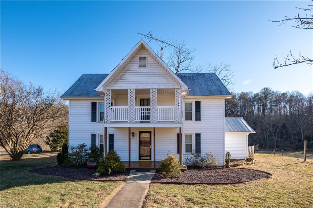 663 Ruritan Road Roaring River, NC 28669 - Photo 40 of 43 Front view of property with second level balcony.