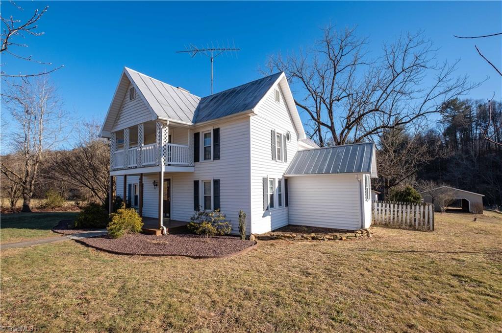 663 Ruritan Road Roaring River, NC 28669 - Photo 41 of 43 Front and side view of property.