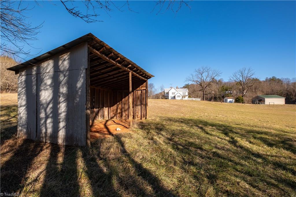663 Ruritan Road Roaring River, NC 28669 - Photo 9 of 43 Pasture has run-in shed
