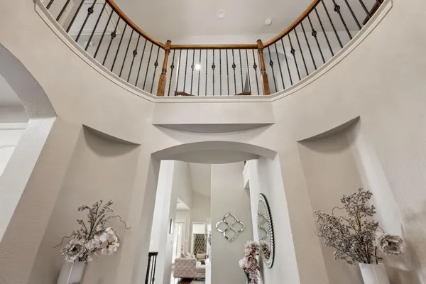 a view of staircase with white walls