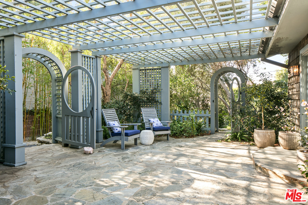 566 Stassi Lane Santa Monica, CA 90402 - Photo 4 of 26 a garden view with a seating space