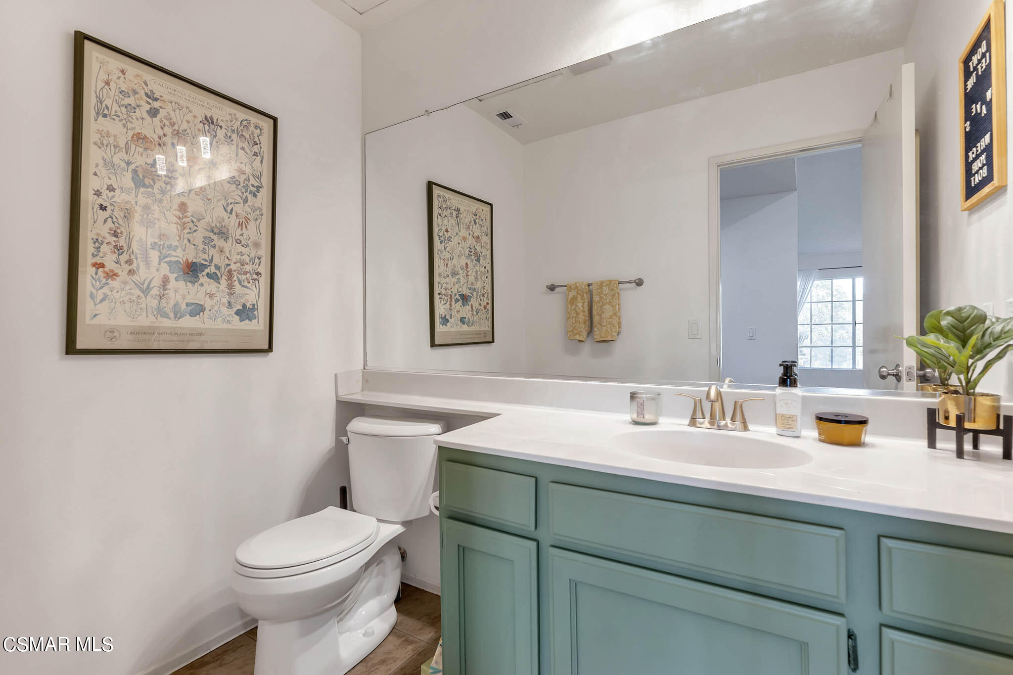 2586 Antonio Drive Camarillo, CA 93010 - Photo 13 of 37 a bathroom with a toilet sink and mirror
