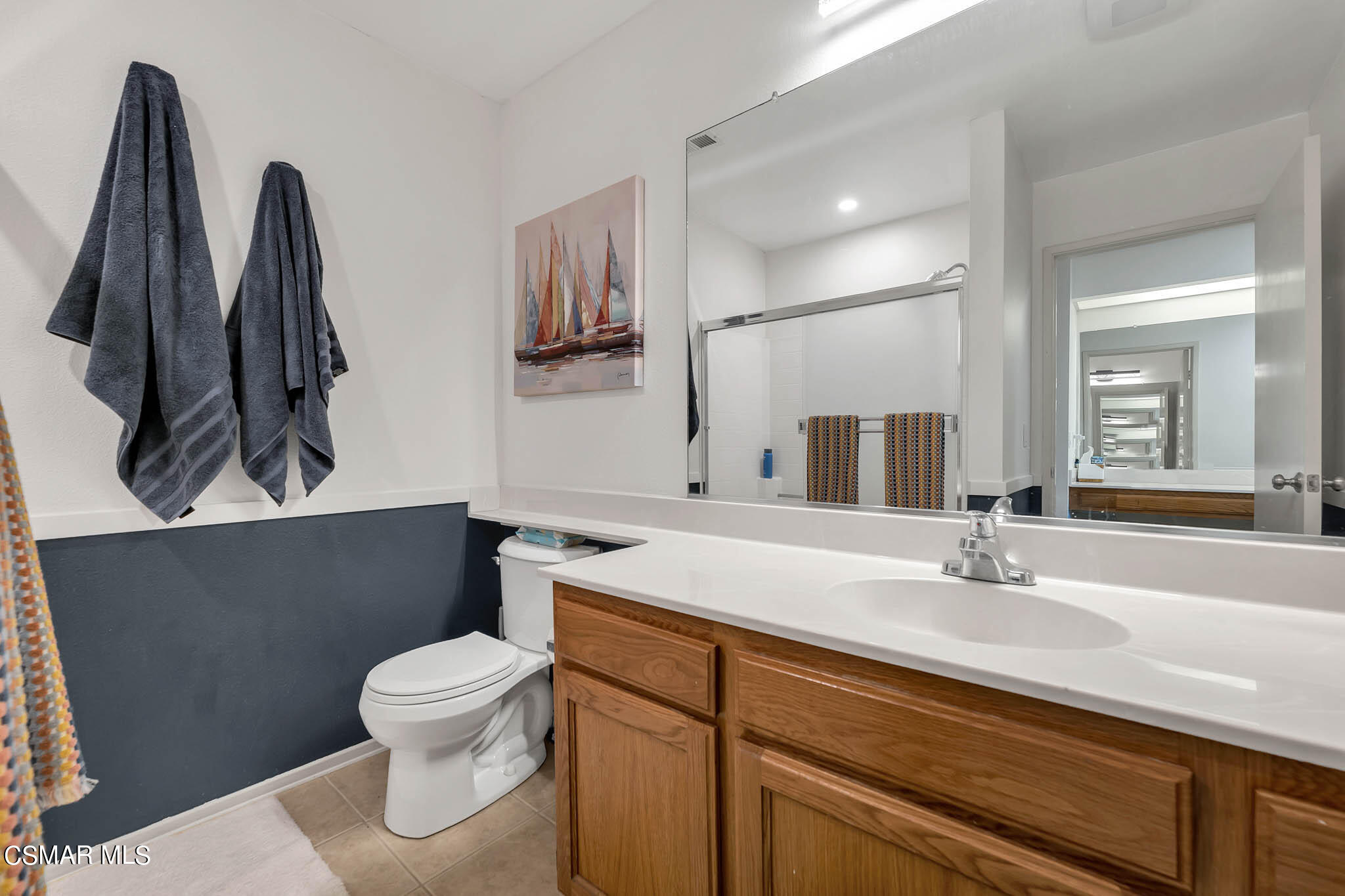 2586 Antonio Drive Camarillo, CA 93010 - Photo 18 of 37 a bathroom with a sink a toilet and mirror