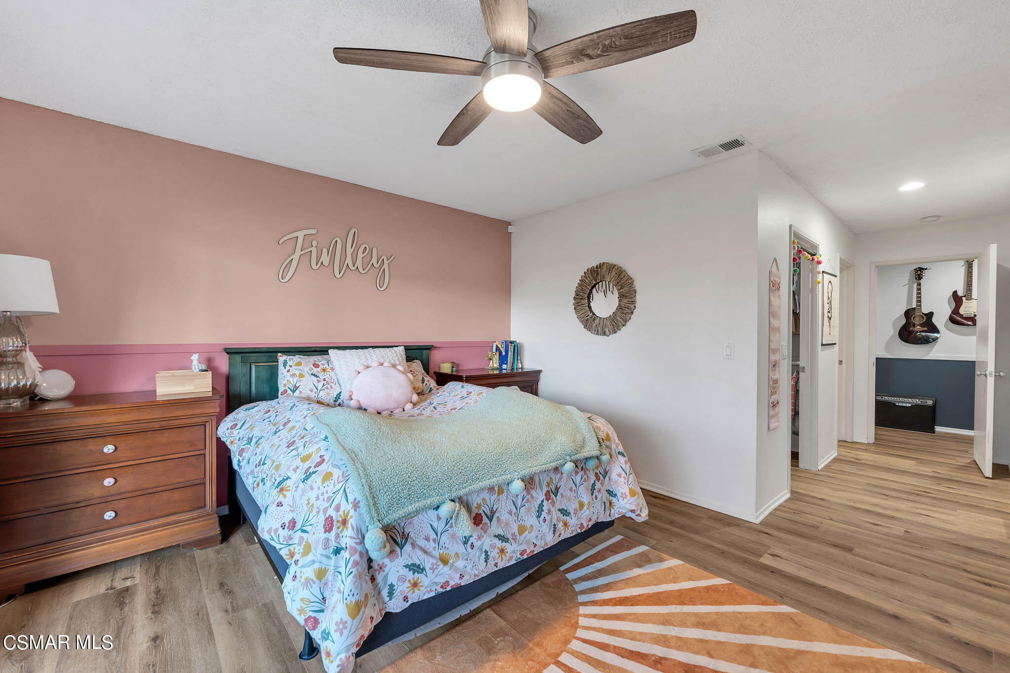 2586 Antonio Drive Camarillo, CA 93010 - Photo 20 of 37 a bedroom with a bed and a chandelier