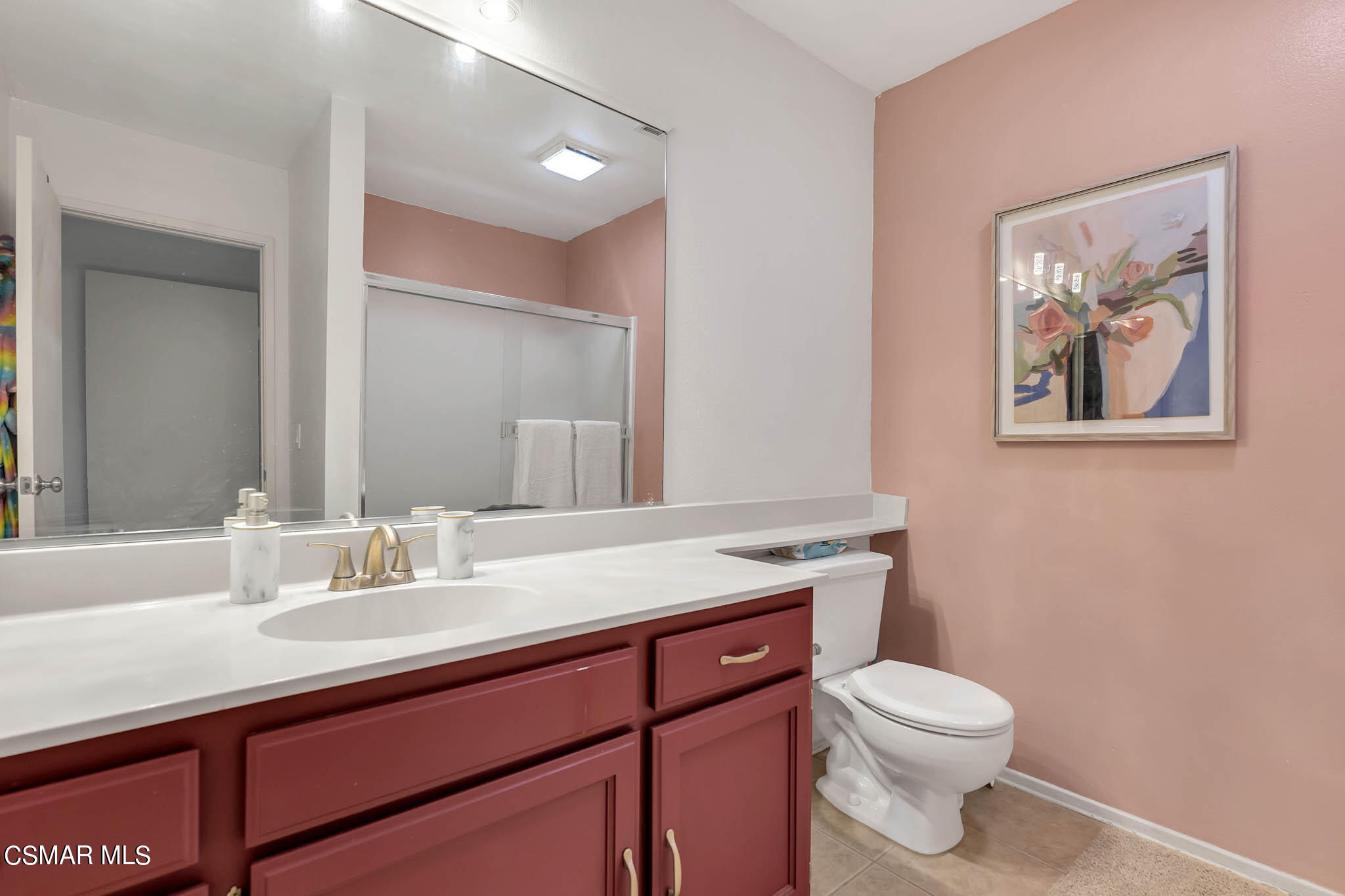 2586 Antonio Drive Camarillo, CA 93010 - Photo 23 of 37 a bathroom with a toilet a sink and mirror