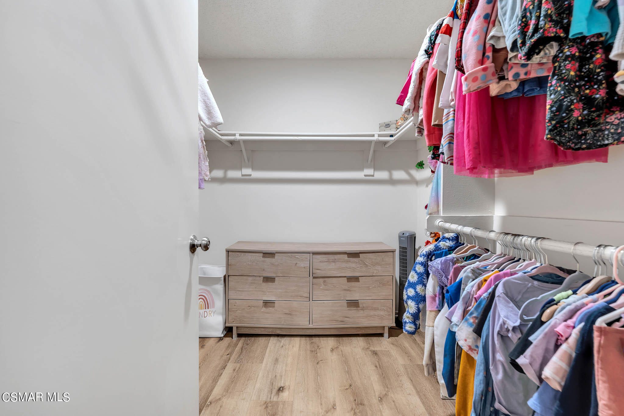 2586 Antonio Drive Camarillo, CA 93010 - Photo 25 of 37 a view of walk in closet with clothes and shoes