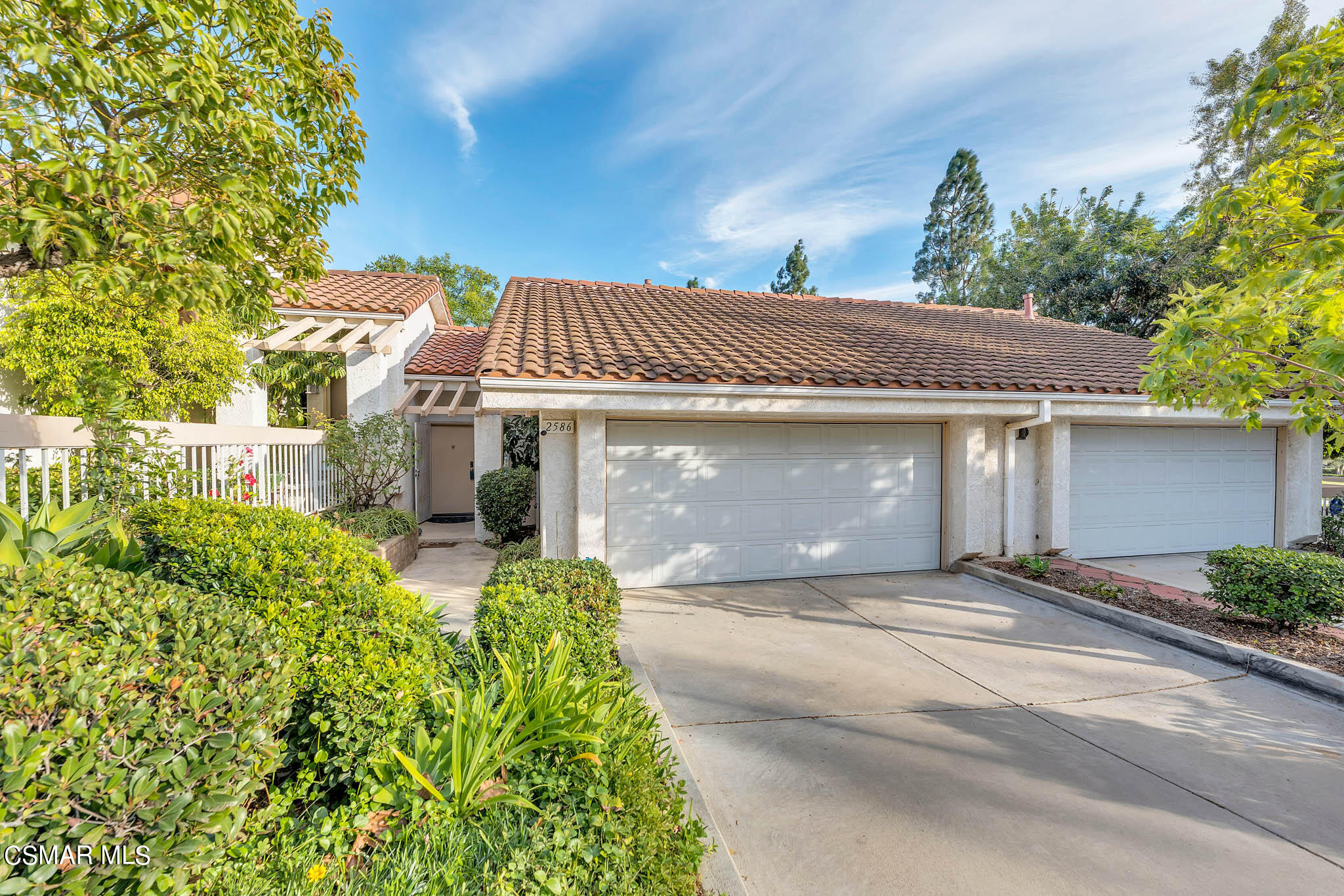2586 Antonio Drive Camarillo, CA 93010 - Photo 35 of 37 a front view of a house with a yard and potted plants