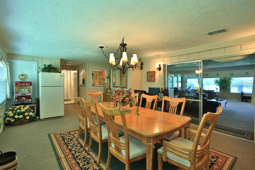 4888 Southwest 7th Avenue Road Ocala, FL 34471 - Photo 15 of 50 a view of a dining room with furniture