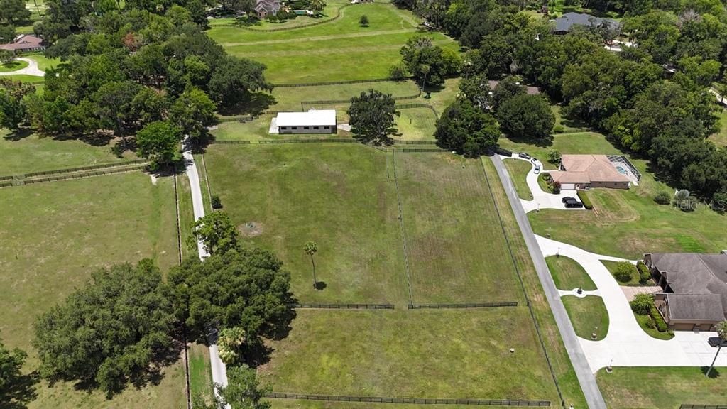 4888 Southwest 7th Avenue Road Ocala, FL 34471 - Photo 36 of 50 a aerial view of a house with a yard