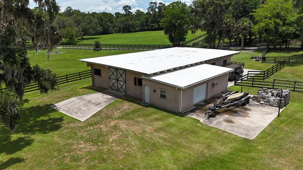 4888 Southwest 7th Avenue Road Ocala, FL 34471 - Photo 43 of 50 a view of a backyard with a garden and outdoor seating