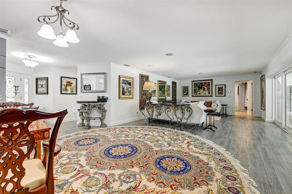 1875 Belleair Road Clearwater, FL 33764 - Photo 12 of 100 a living room with furniture and wooden floor