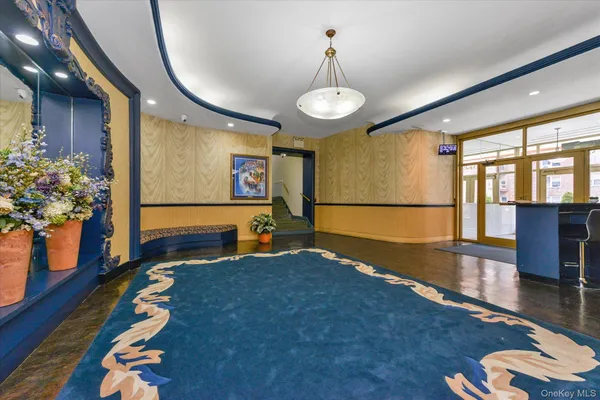 a view of an entryway with a workspace