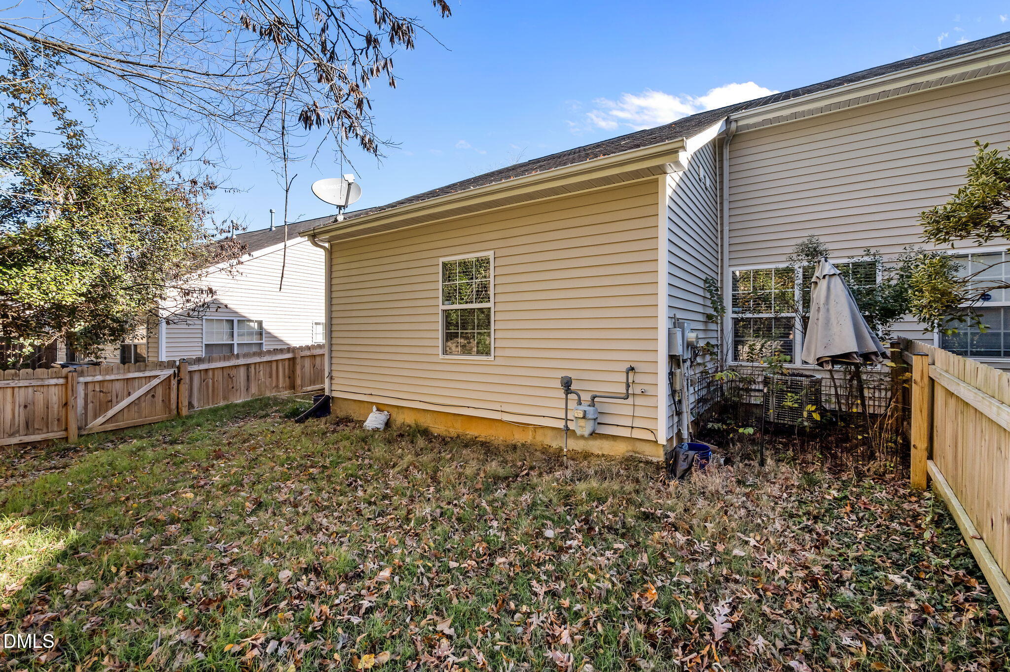 4211 Holston Drive Durham, NC 27704 - Photo 22 of 33 a backyard of a house with table and chairs