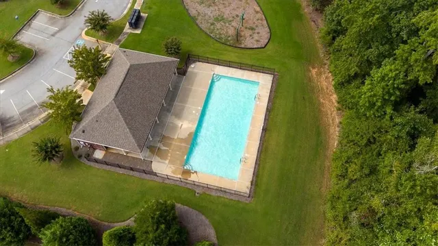 an aerial view of a house having yard