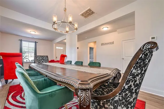 a room with furniture and a chandelier