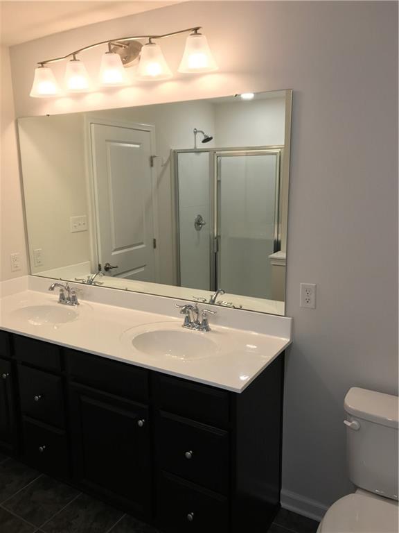 2004 Pointe View Drive Mars, PA 16046 - Photo 13 of 23 a bathroom with a sink and a mirror